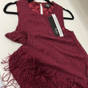 Parker black Allegra mini dress with feathers.